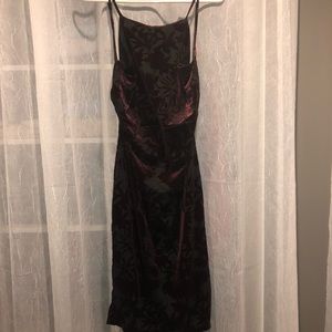 Red and black open back velvet dress